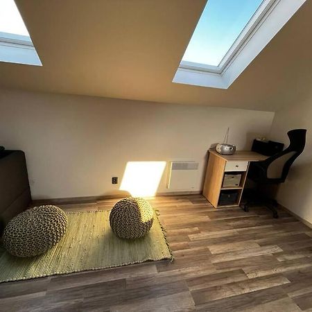 Příjemný podkrovní byt s parkováním na pozemku. Tršice Exterior foto